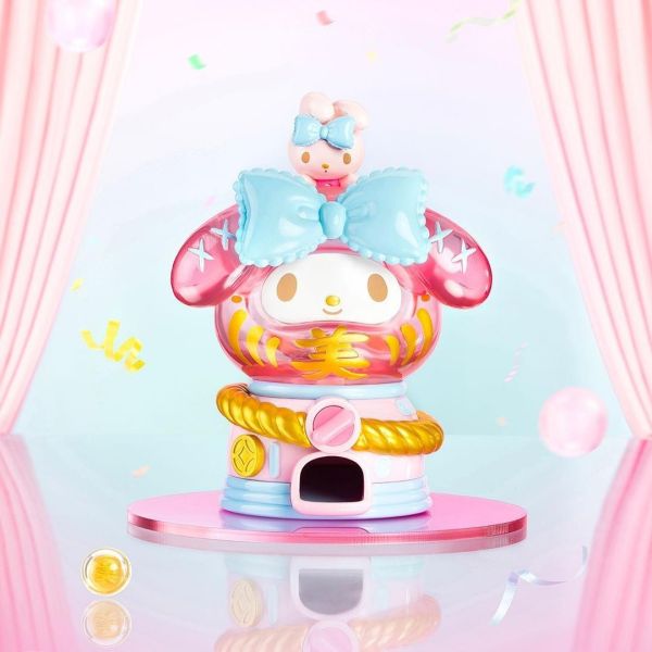 Pastel-colored My Melody Gachapon Dharma doll with a large blue bow, from the Sanrio blind box series