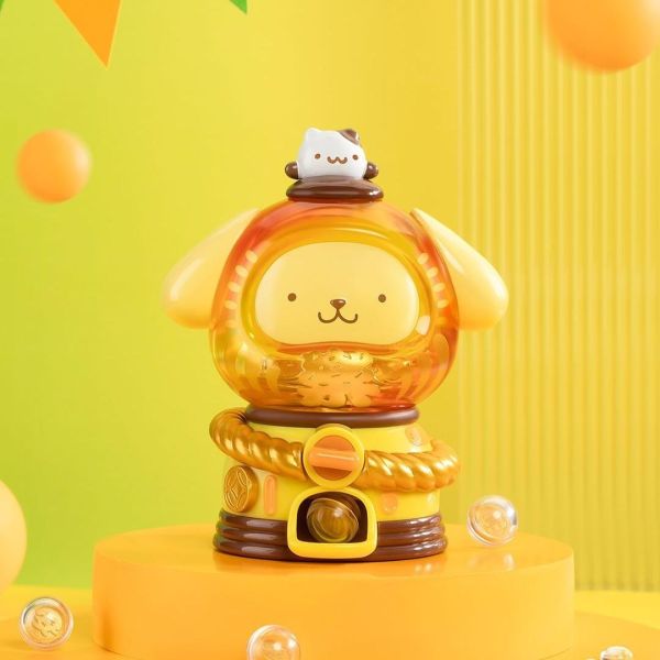 Sanrio Pompompurin Gachapon blind box featuring a lion-themed Dharma doll in vibrant yellow