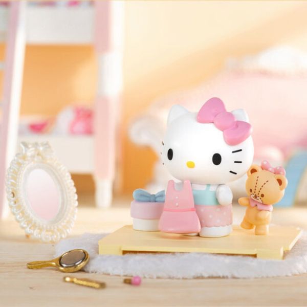 Hello Kitty figurine with a mirror and tiny bear, from the Sweetheart Companion Blind Box collection.