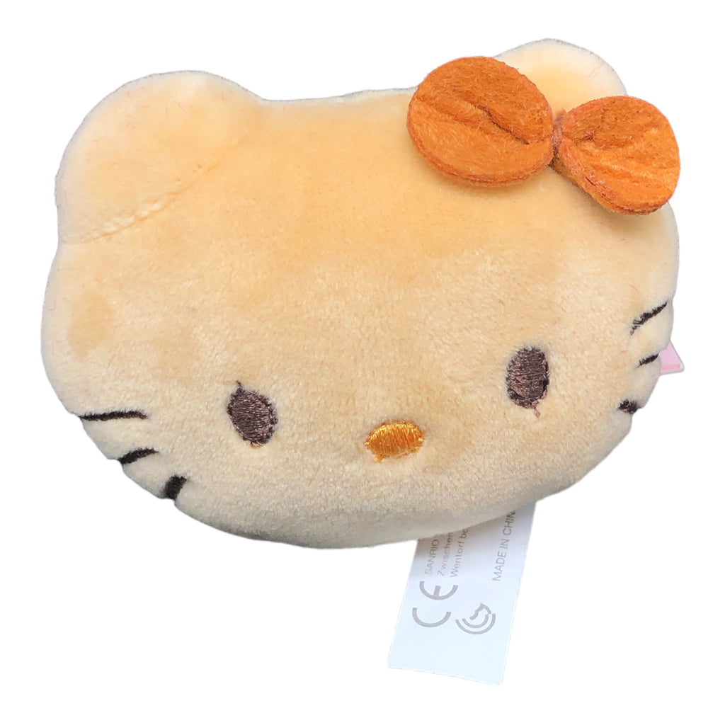 Sanrio Hello Kitty squishy mascot plush with a soft beige texture and the classic bow on top