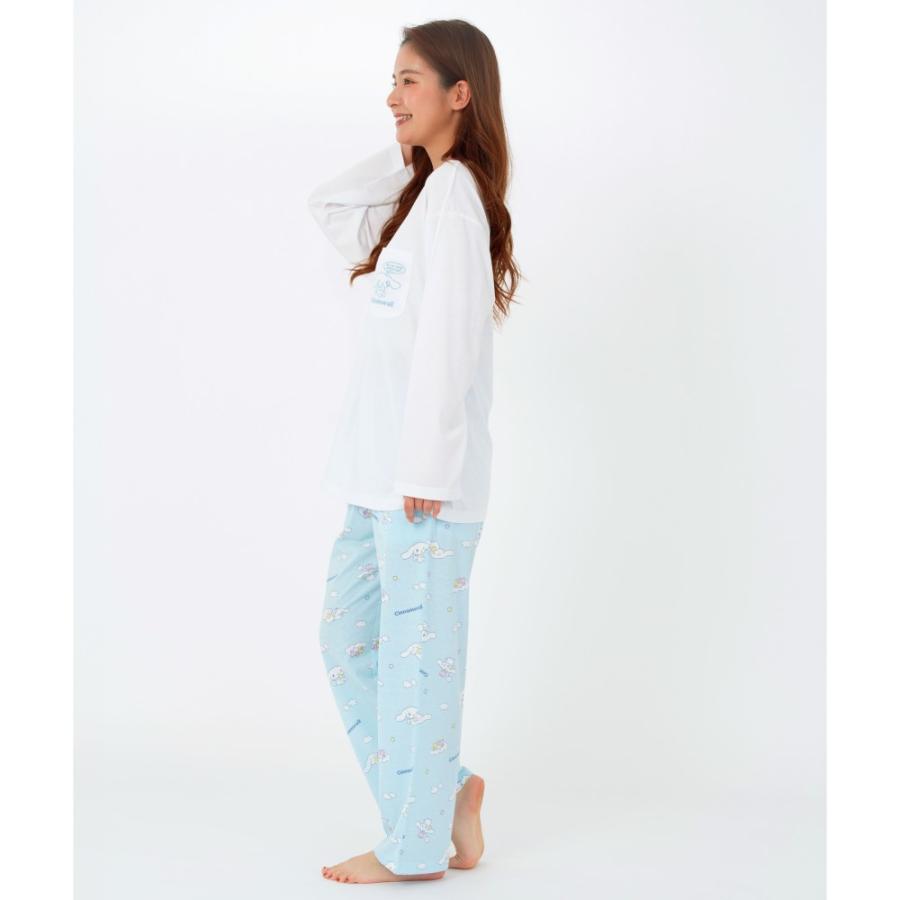 Side view of a woman in Cinnamoroll pajamas showcasing the long sleeves and comfortable fit.