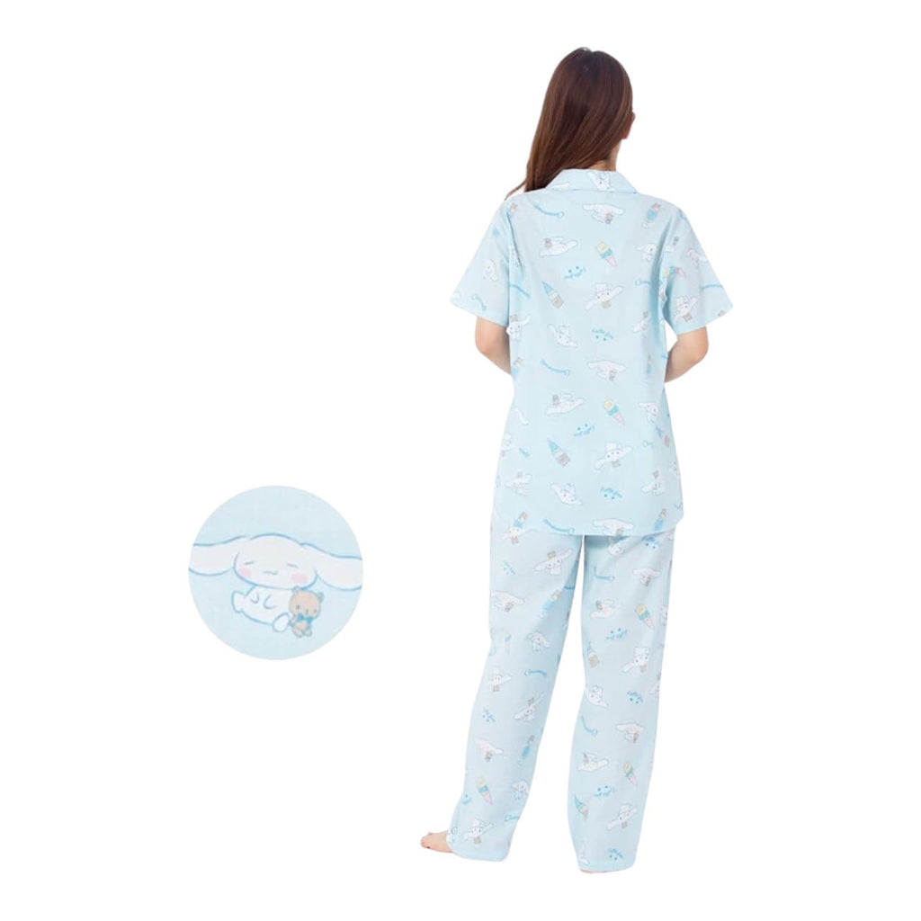 Back view of a woman in Cinnamoroll pajamas, showcasing the cute character print and comfortable fit of the sleepwear.
