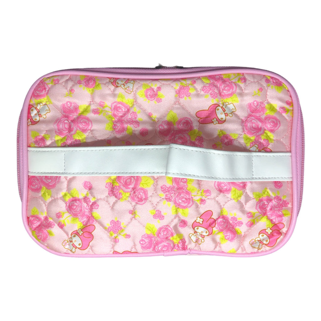 Sanrio My Melody travel toiletry bag laid flat, showcasing the interior pockets and the pink floral character exterior design.