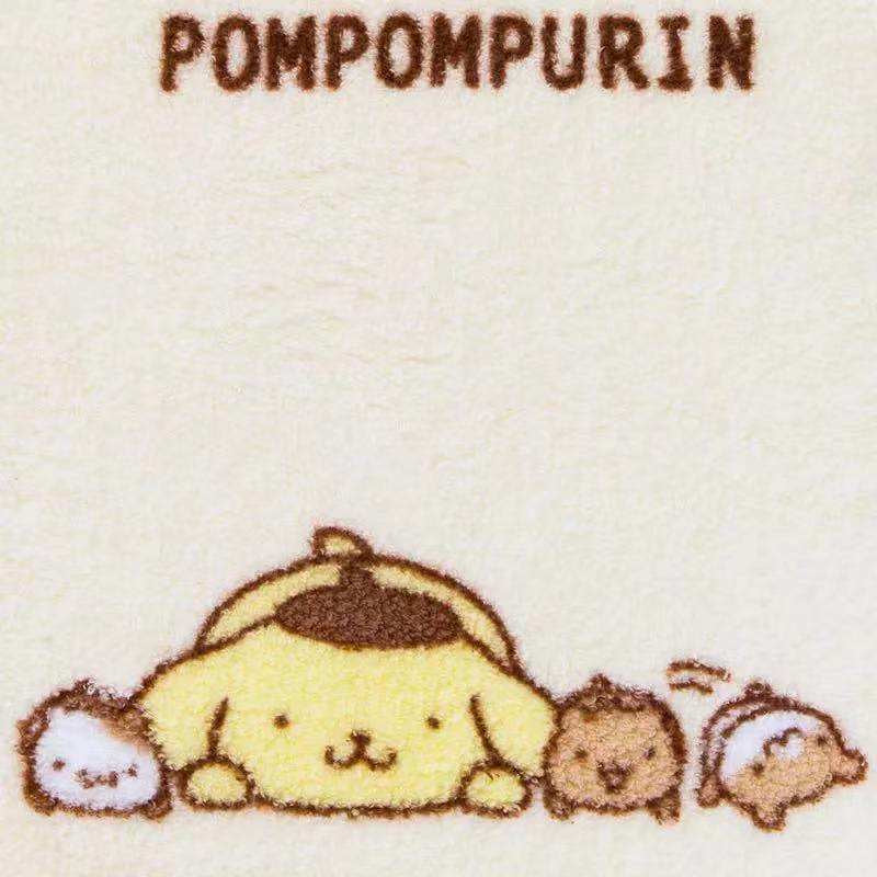 Pompompurin lying down with friends design on a square facial towel with heart and biscuit motifs.