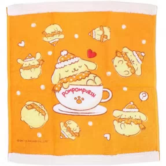 Vibrant orange square facial towel with festive Pompompurin designs, featuring the character in a teacup surrounded by playful graphics of hearts and croissants.