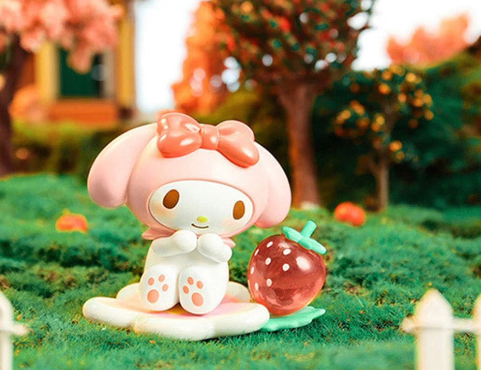 Close-up of My Melody figure holding a strawberry from the Sanrio Strawberry Farm Blind Box series