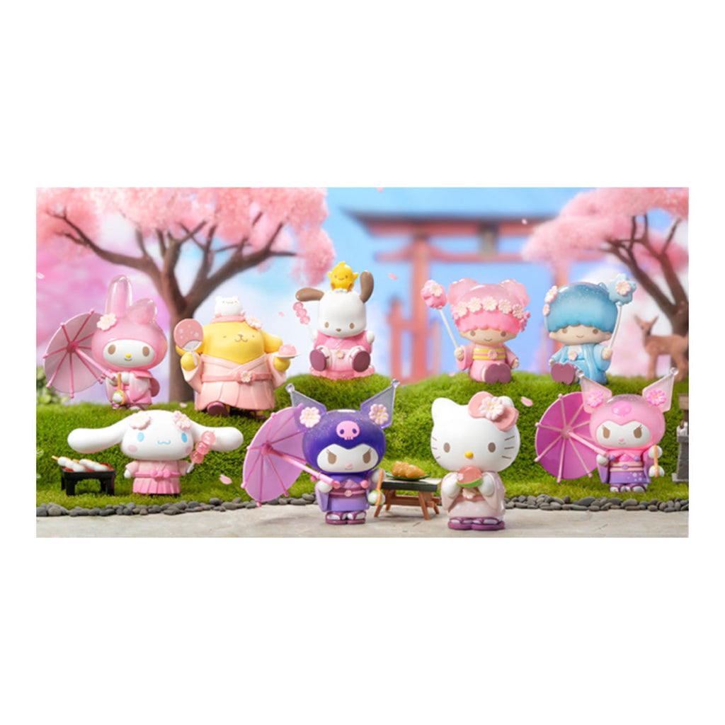 Collection of Sanrio Characters Blossom & Wagashi Series Blind Box figures displayed in a springtime setting, with characters like Hello Kitty, My Melody, and Cinnamoroll dressed in traditional Japanese attire and holding wagashi sweets.