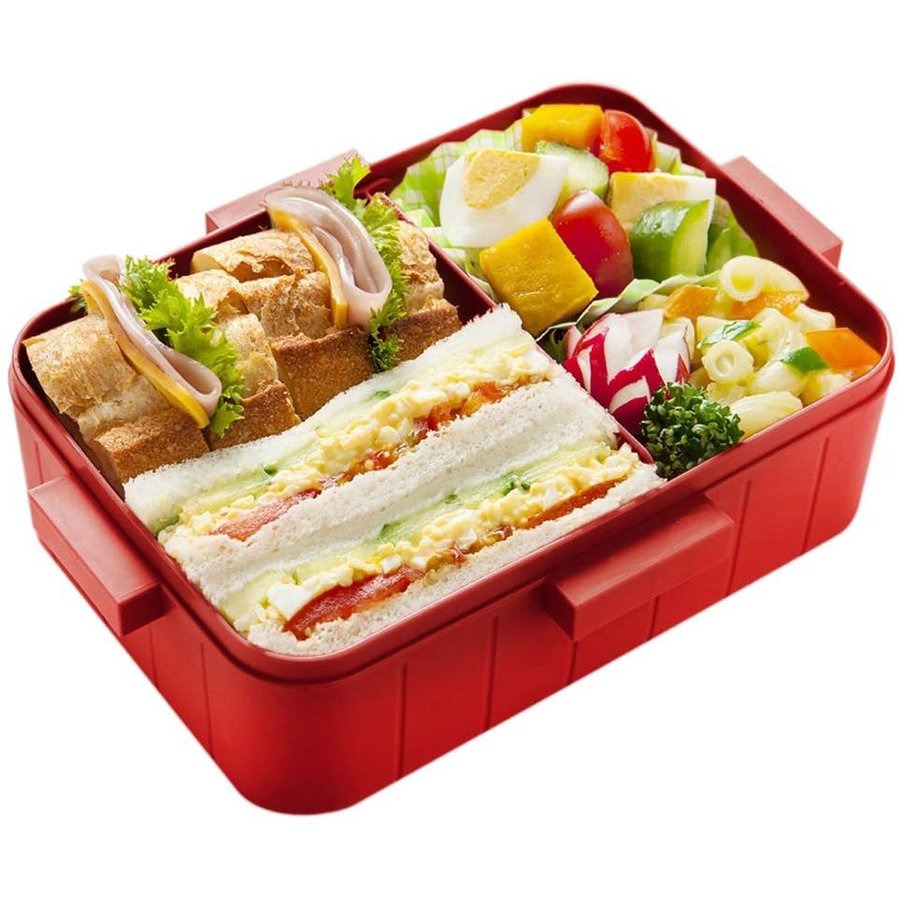 Pikachu Lunch Box with sandwiches and fresh fruits, showcasing its versatility for different meal options.