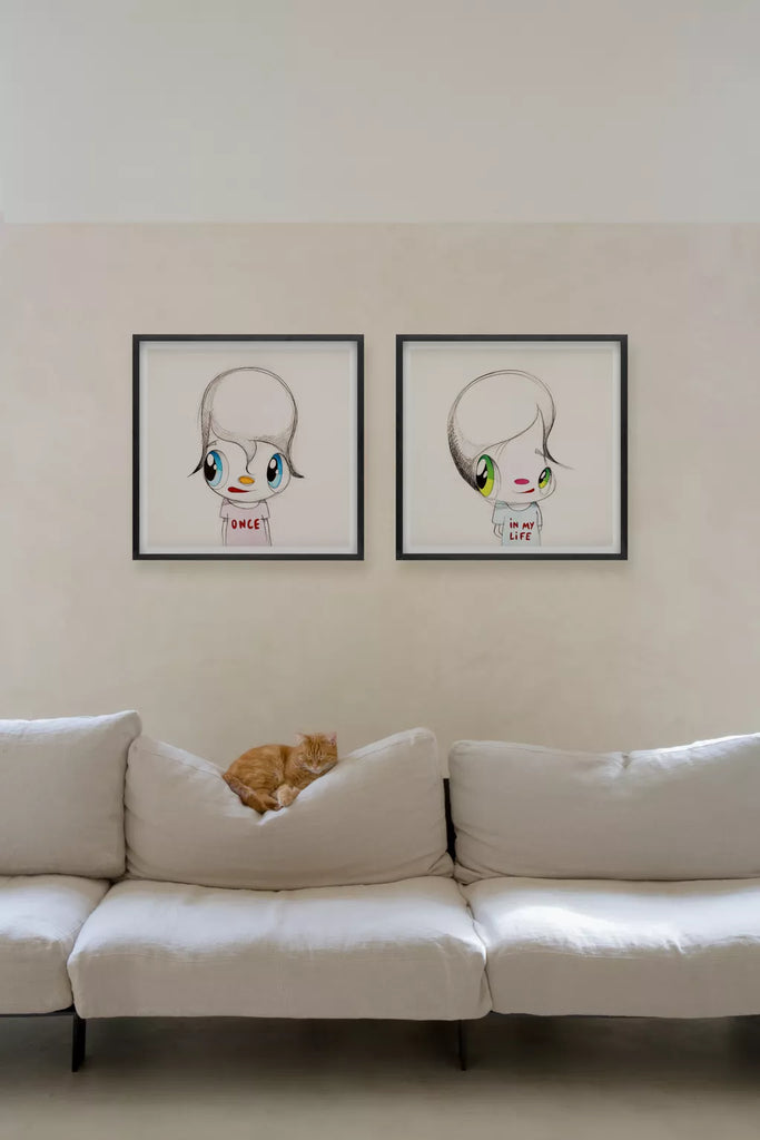 Javis Calleja once in my life limited edition print decorating the wall and with a brown cat