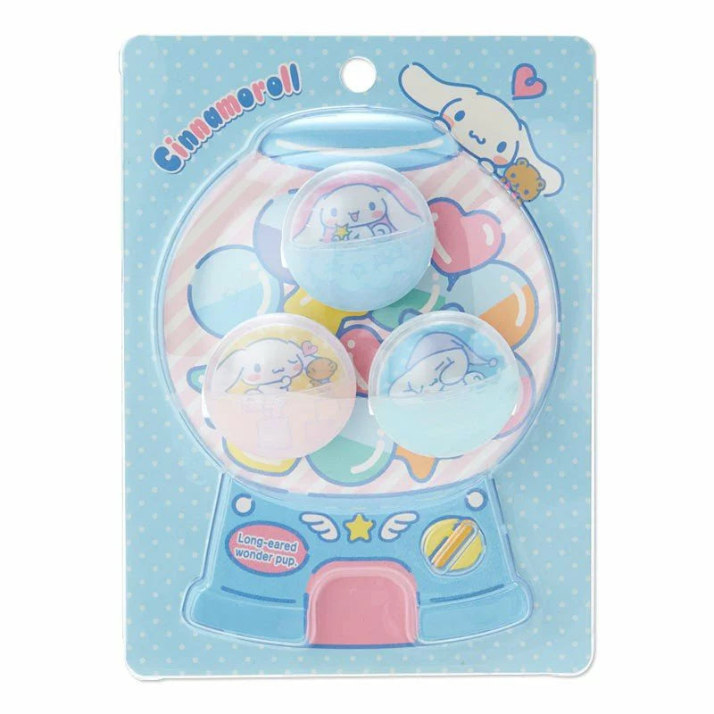 Packaging of Sanrio Cinnamoroll Gashapon shell-shaped plastic clip set featuring cute Cinnamoroll characters and the phrase 'Long-eared wonder pup'