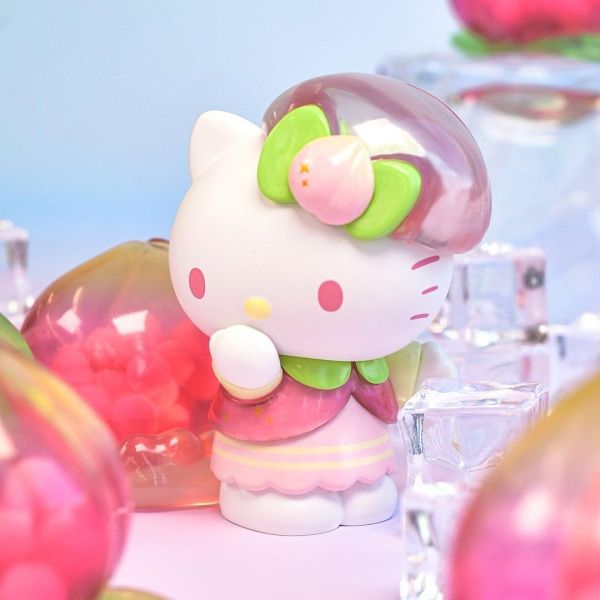 Sanrio character Hello Kitty from the Vitality Peach Paradise Blind Box, wearing a green bow and holding a peach.