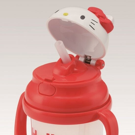 Open sippy cup showcasing the spill-proof silicone spout with a Hello Kitty figure lid, easy for little hands to operate