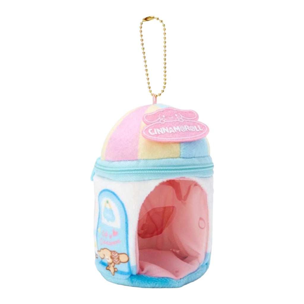 Sanrio Cinnamoroll plush charm with a red cap and zipper, designed as a mini house with a clear window