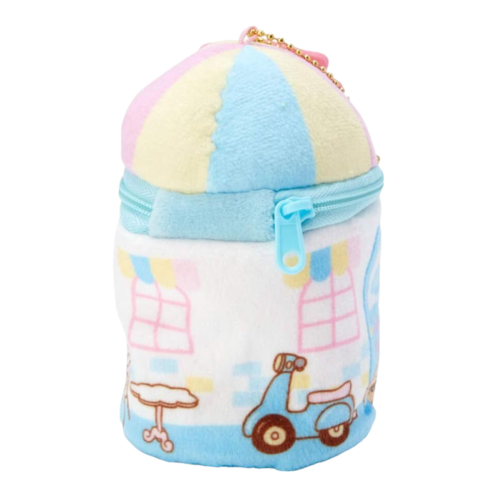 Side view of Cinnamoroll plush charm with a house design, showcasing a blue zipper and cute window and door embroideries