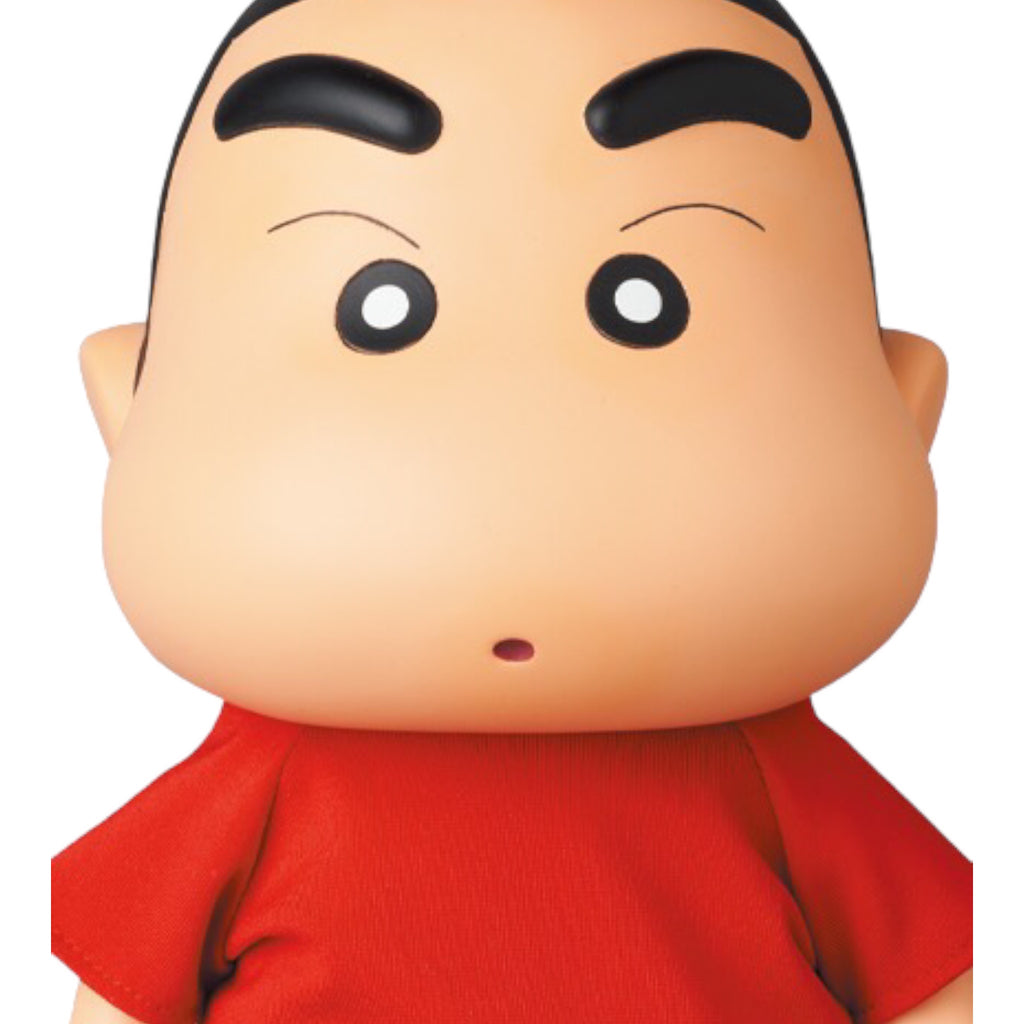 Close-up of Shin-Chan action figure's face with large eyes and a puzzled expression.