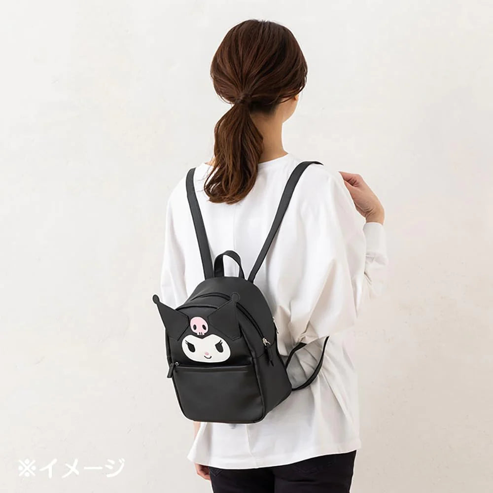 The Sanrio Kuromi Backpack on the female model's back