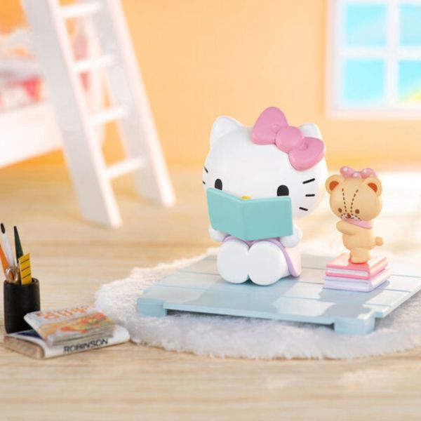 Hello Kitty reading a book with teddy bear friend, a delightful scene from the Sweetheart Companion series