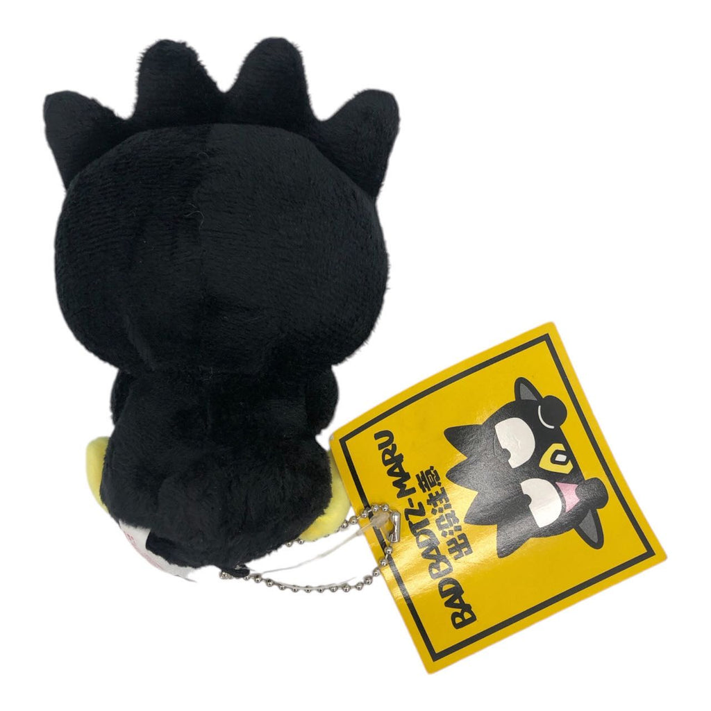 Back view of Sanrio Badtz-Maru Emoji KeyChain Plush with chain attachment.