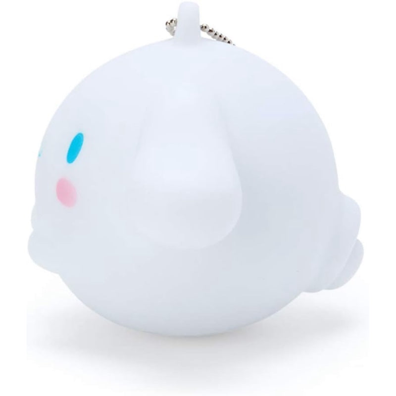 Side view showcasing the soft, squeezable silicone design of the Cinnamoroll keychain with sound.