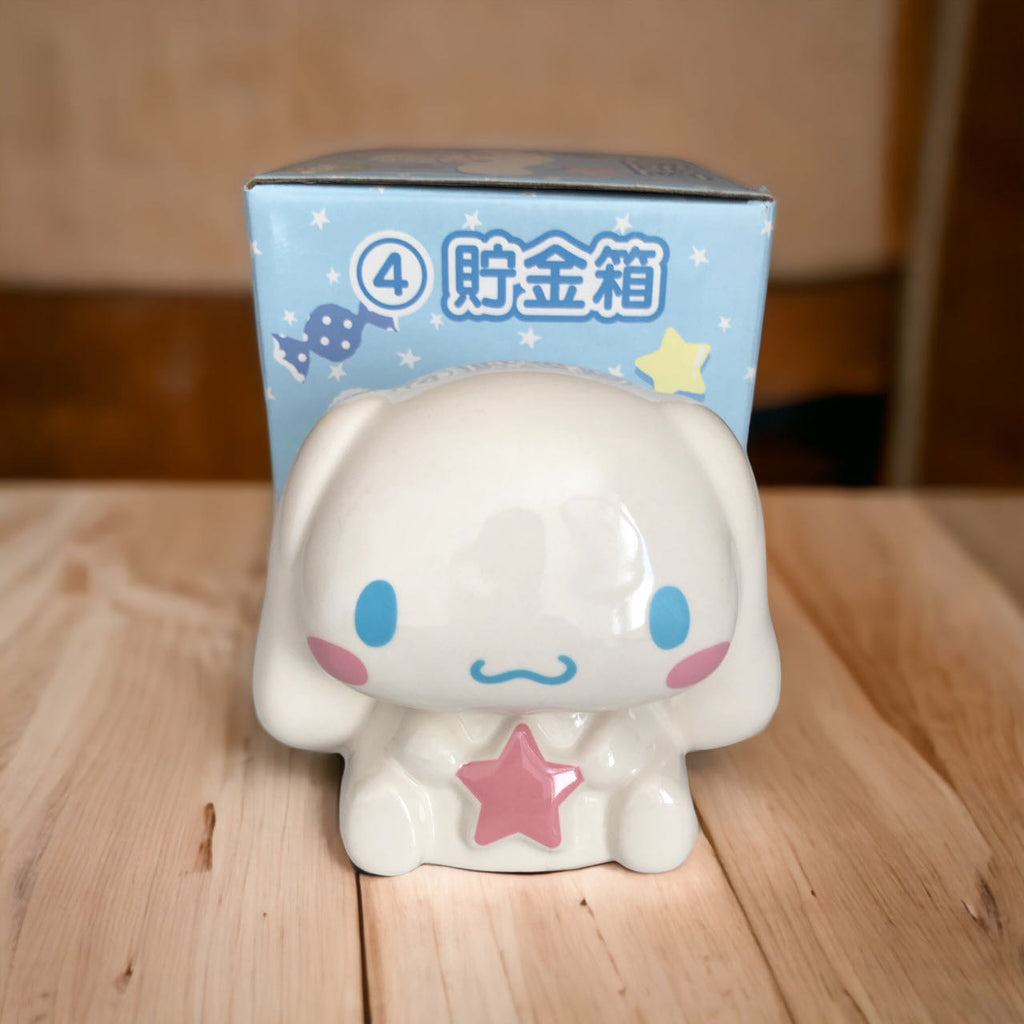 Sanrio Cinnamoroll is holding a pink star and is been placed on a table