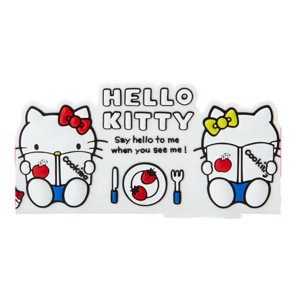 Front close-up of the Hello Kitty Magnet Clip featuring red and yellow bow characters holding cookbooks.