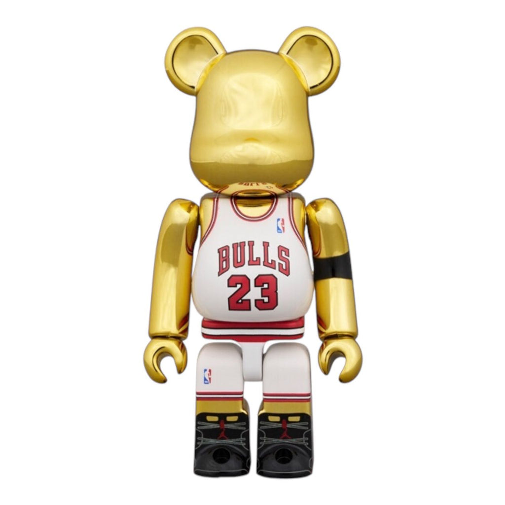 Back view of BEARBRICK Michael Jordan collectible set with gold accents and #23.