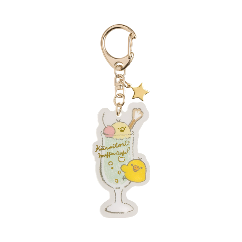 Front view of the Kiiroitori Muffin Cafe acrylic keychain featuring a drink design and gold star charm.