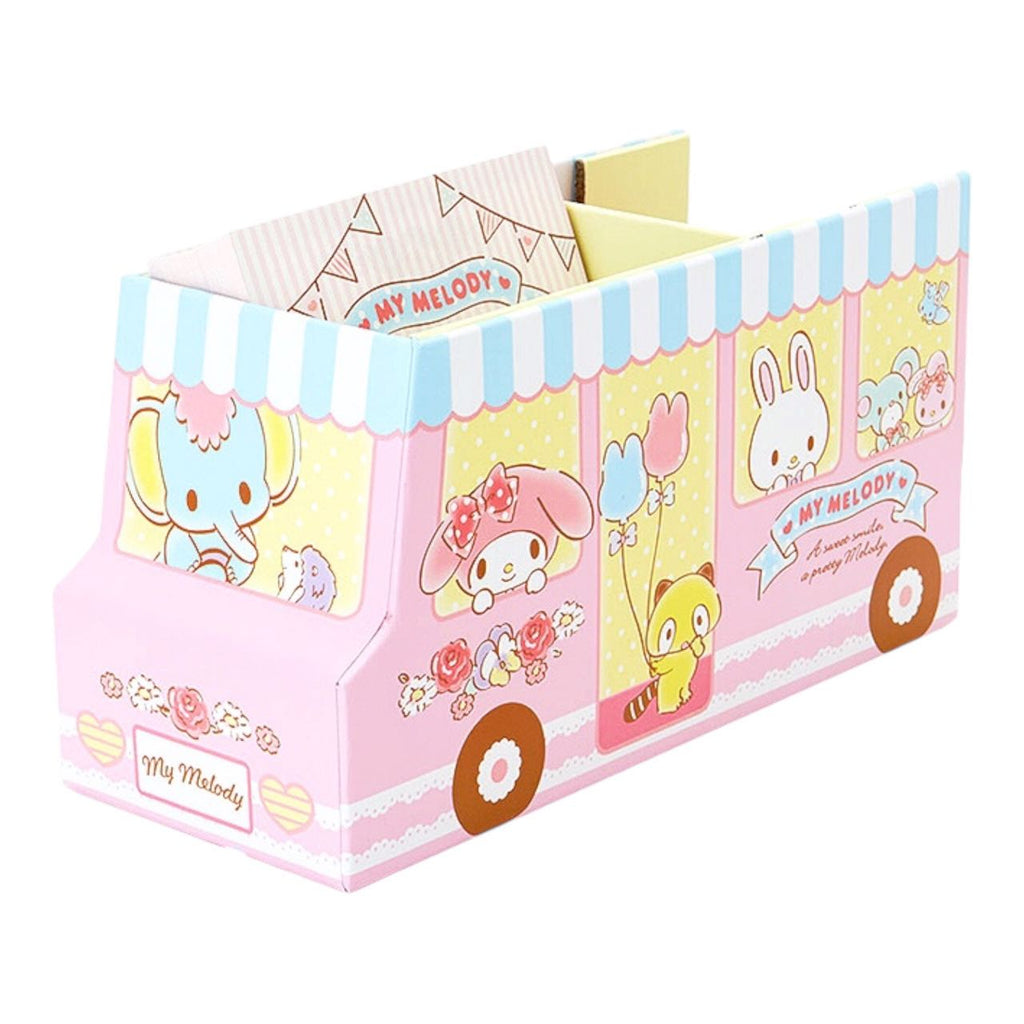 My Melody bus-shaped dispenser with memo pads inside.