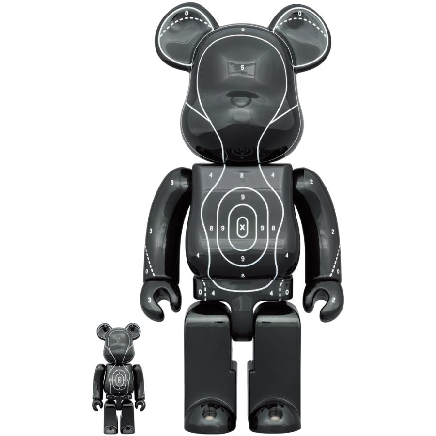 Black glossy Bearbrick figurines in 400% and 100% sizes, featuring futuristic digital-themed designs, a collaboration between Emotionally Unavailable and Neighborhood.
