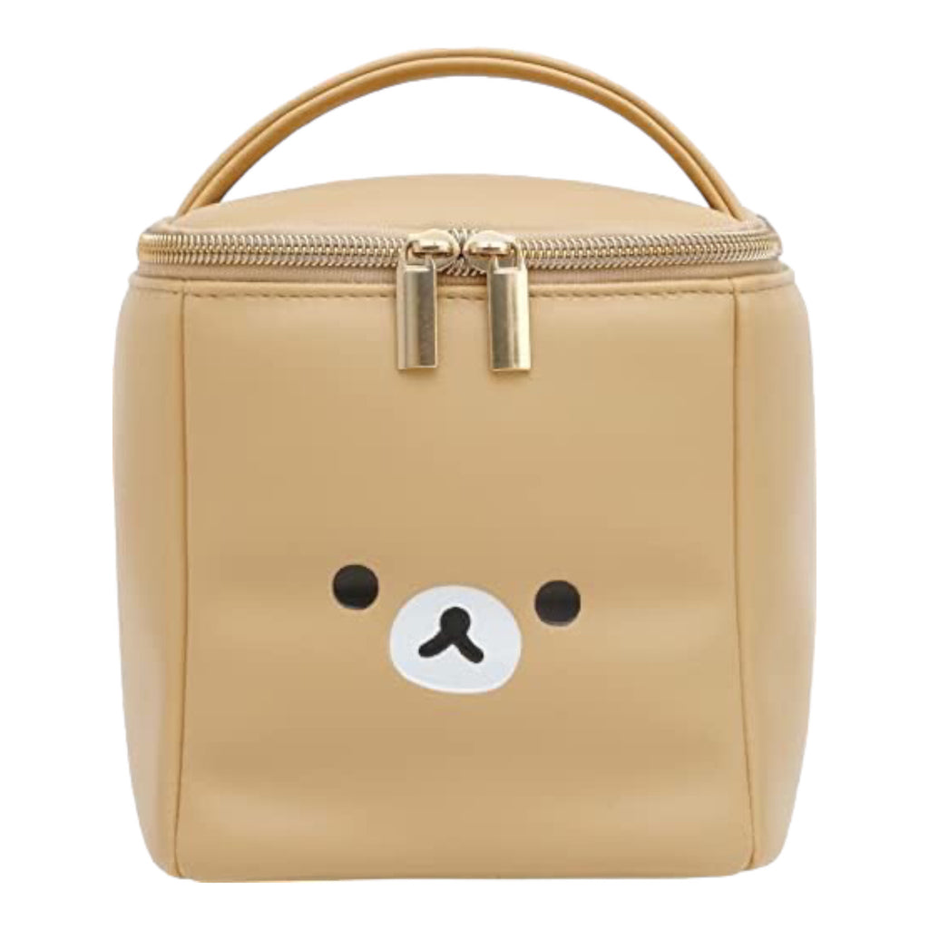 Close-up of the San-X Rilakkuma beige makeup pouch case with a cute bear face and zipper closure.