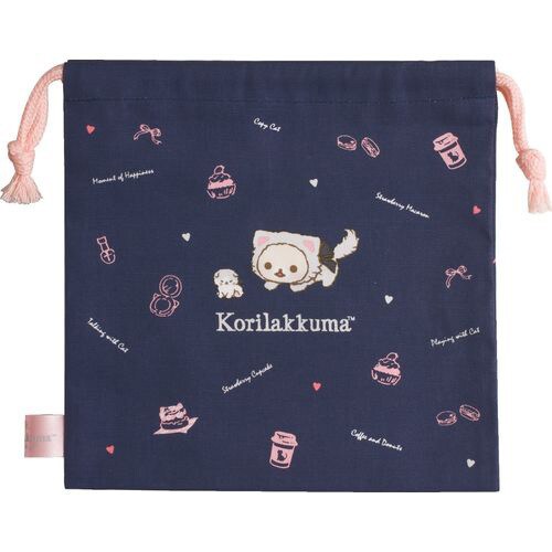 Back side of Korilakkuma Cat navy drawstring pouch with adorable pink dessert illustrations.