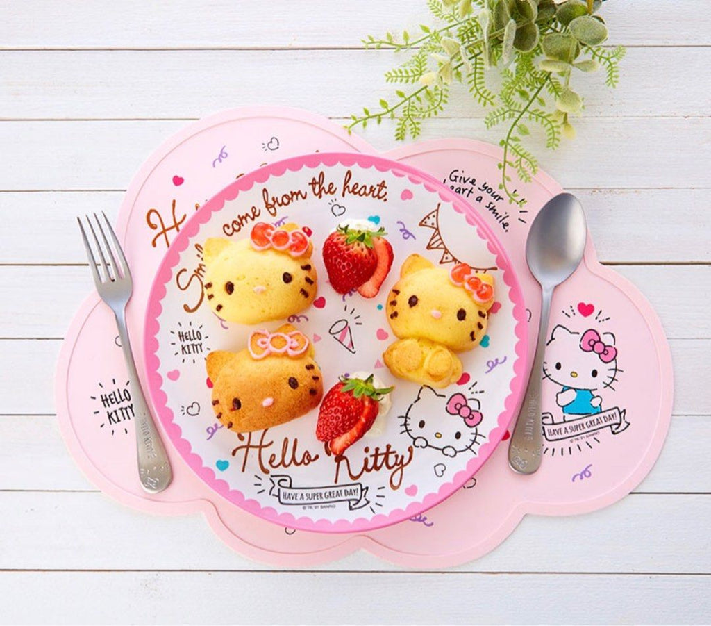 Hello Kitty silicone placemat with decorated food, highlighting its charming and playful design.