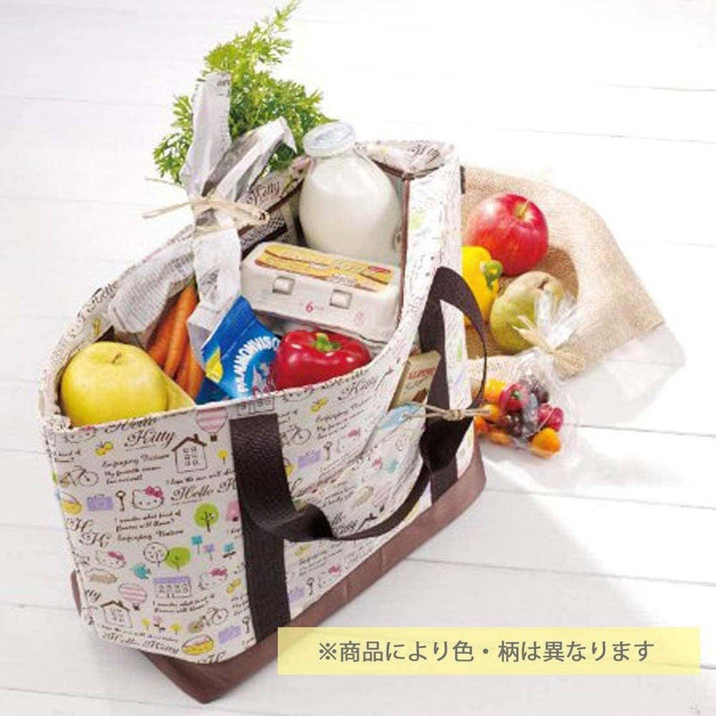 Snoopy PEANUTS insulated tote bag filled with groceries, demonstrating its large capacity and versatile use for shopping or picnics