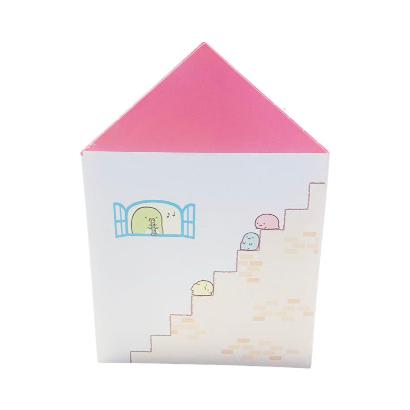 Rear view of the Sumikko Gurashi pink house box with detailed artwork of characters climbing stairs.