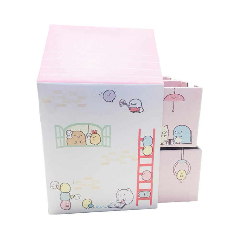 Side view of the Sumikko Gurashi pink house storage box showcasing colorful character designs.