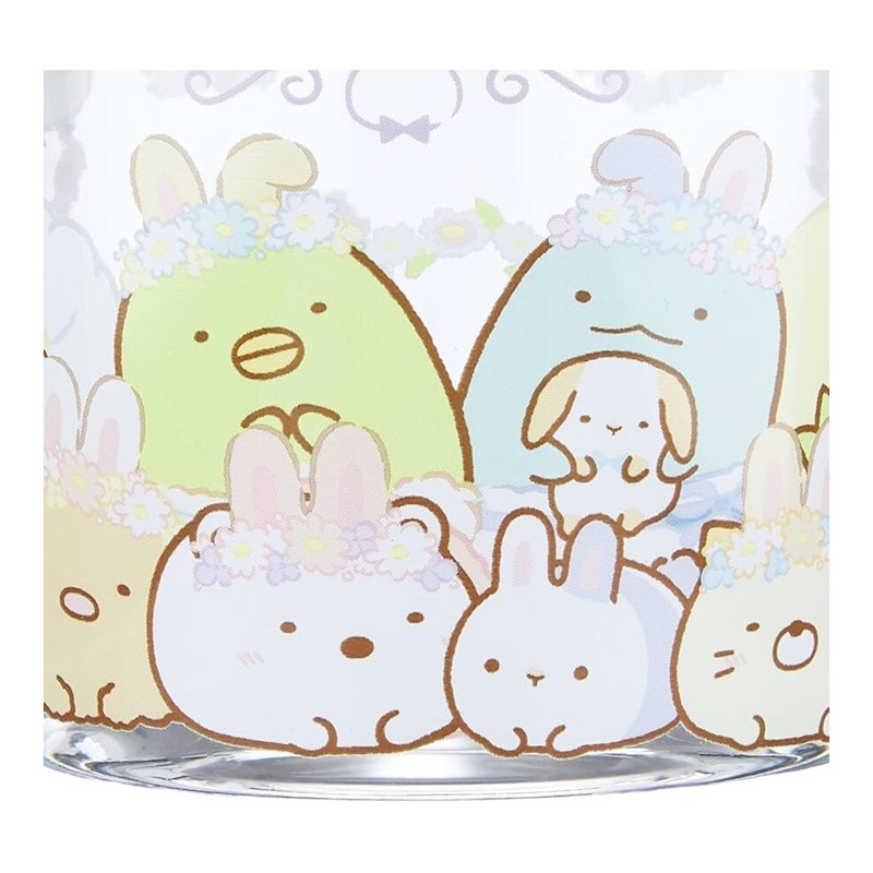 Close-up view of Sumikko Gurashi cup with pastel floral design