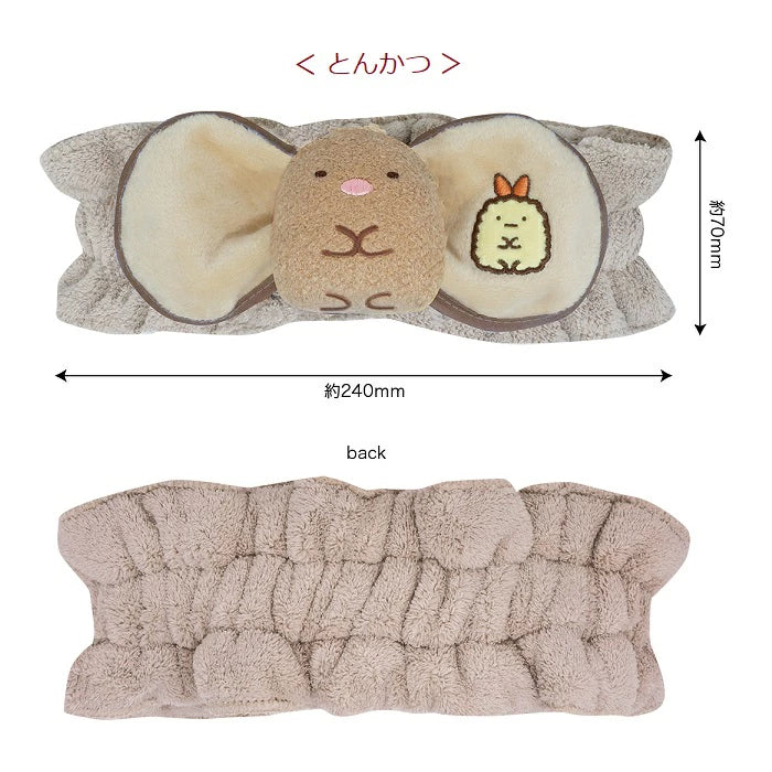 San-X Sumikkogurashi Tonkatsu hairband, featuring a plush Tonkatsu character in beige and brown tones with a cute, comfortable design for holding hair back.