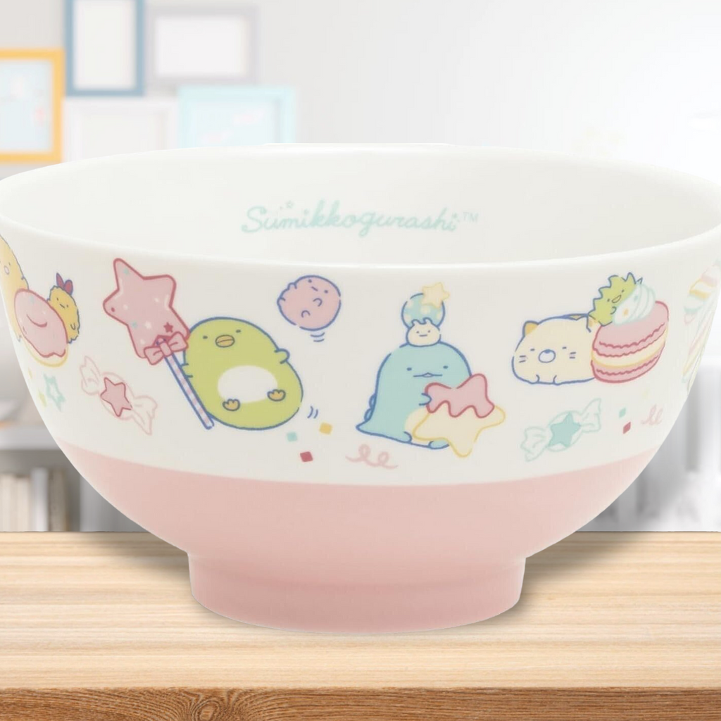 San-X Sumikkogurashi Ceramic Rice Bowl in pink featuring playful characters and treats around the rim, perfect for adding fun to meal times.