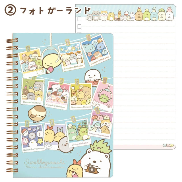 Sumikko Gurashi B6 spiral notebook cover featuring polaroid-style photos of Sumikko Gurashi characters gathered together, with a pastel blue background.