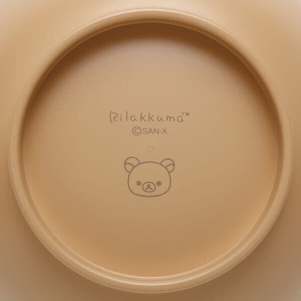Underside of the Rilakkuma ABS resin bowl showing the San-X trademark and Rilakkuma's face, signifying authenticity.