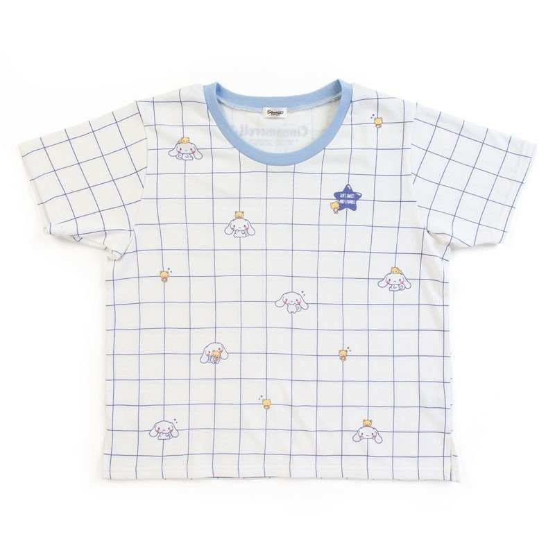 Close-up of the Sanrio Cinnamoroll Pyjama top with white and blue grid pattern and Cinnamoroll motifs.