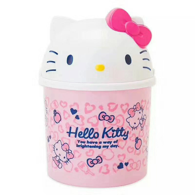 Hello Kitty themed desktop bin in pink with heart and bow designs, topped with a signature Hello Kitty face