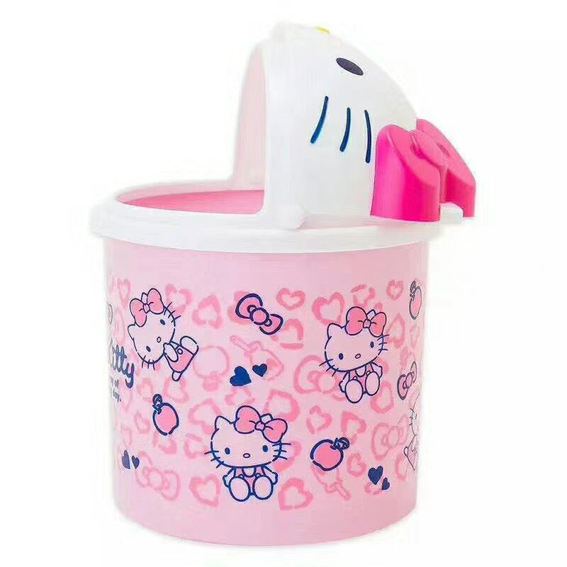 Pink desktop rubbish bin adorned with Hello Kitty graphics, complete with a white Hello Kitty-shaped lid and a bright pink bow