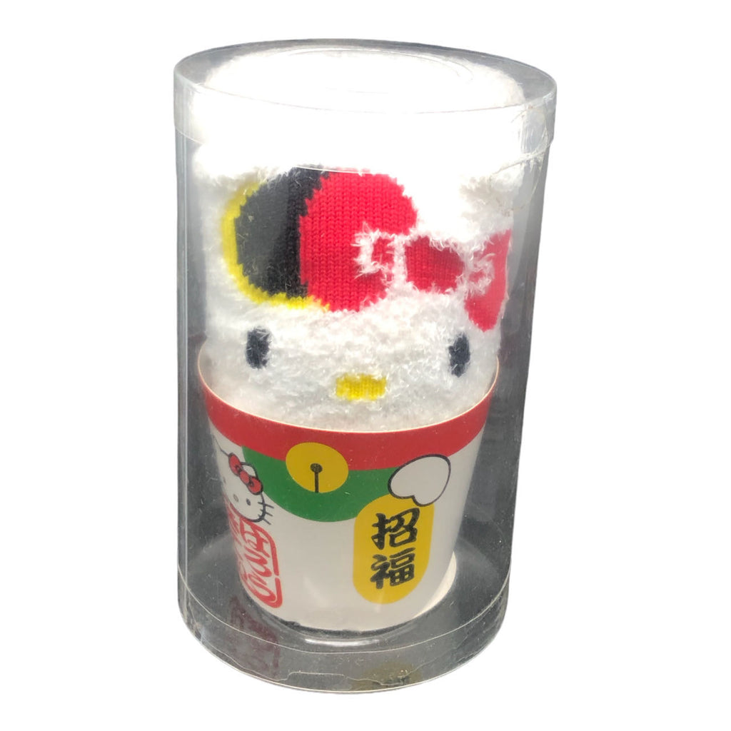 Hello Kitty Cup Noodle socks packaged in a clear tube, showcasing the playful and colorful design