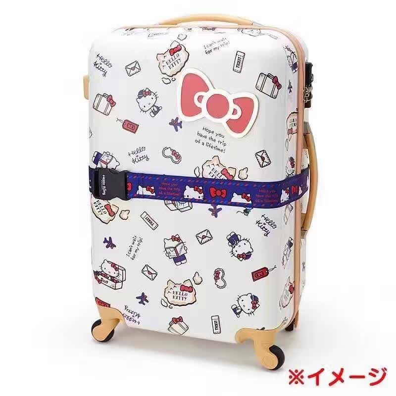 Sanrio Hello Kitty luggage strap on a suitcase, demonstrating its use and design with Hello Kitty motifs and travel-inspired phrases.