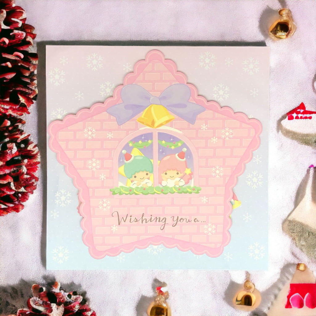 Sanrio Little Twin Stars Christmas Card in a festive backdrop, with the twins in a holiday-themed window and the message 'Wishing You...'
