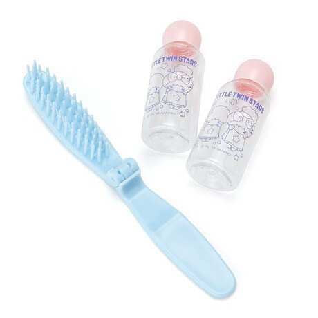 Sanrio Little Twin Stars travel-sized toiletries including a blue brush and two bottles with character prints
