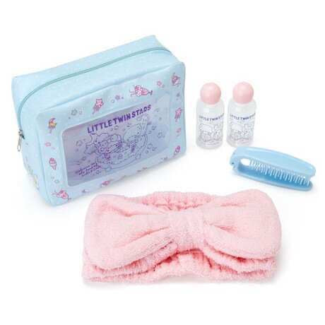 Complete set of Little Twin Stars travel bath accessories with organizer bag, bottles, brush, and a pink hair towel wrap, laid out on a white background