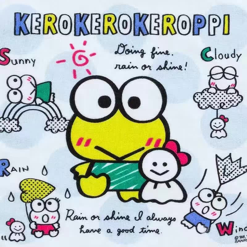 Close-up of Sanrio Keroppi towel showing Keroppi smiling under a rainbow and interacting with weather symbols like sun, clouds, and raindrops, highlighting a cheerful and dynamic design.