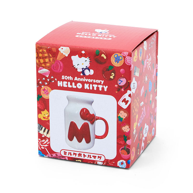 Packaging of the Hello Kitty 50th Anniversary milk bottle style mug, featuring colorful Hello Kitty themed decorations and an image of the mug.